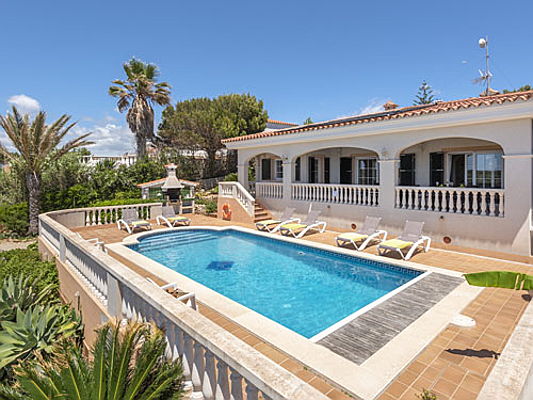  Hamburg
- Located on the rocky south coast of Menorca, this Mediterranean-style villa is on the market for 650,000 euros. The residence affords three bedrooms, two bathrooms, and a living room with a dining area. The outdoor highlights include several different terraces and a garden with a pool.