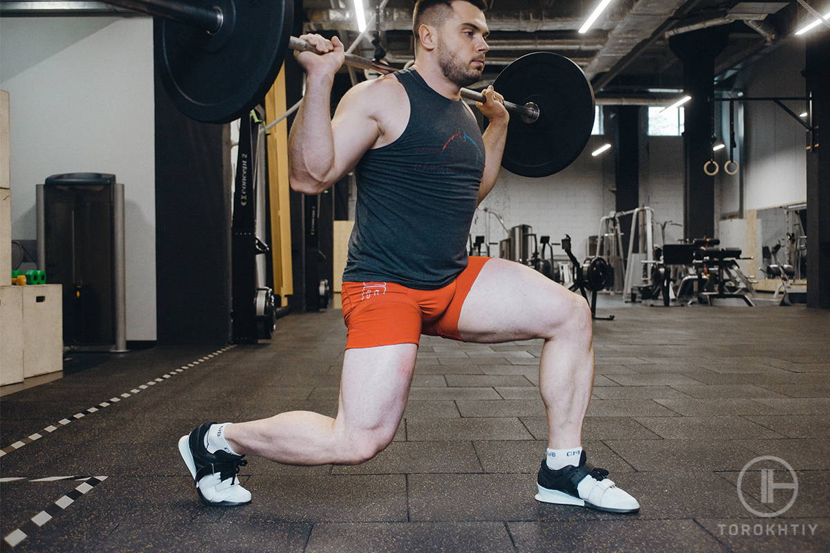 flat-lifting-shoes Powerlifter with a Barbell Training in Flat Bottom Shoes for Weightlifting