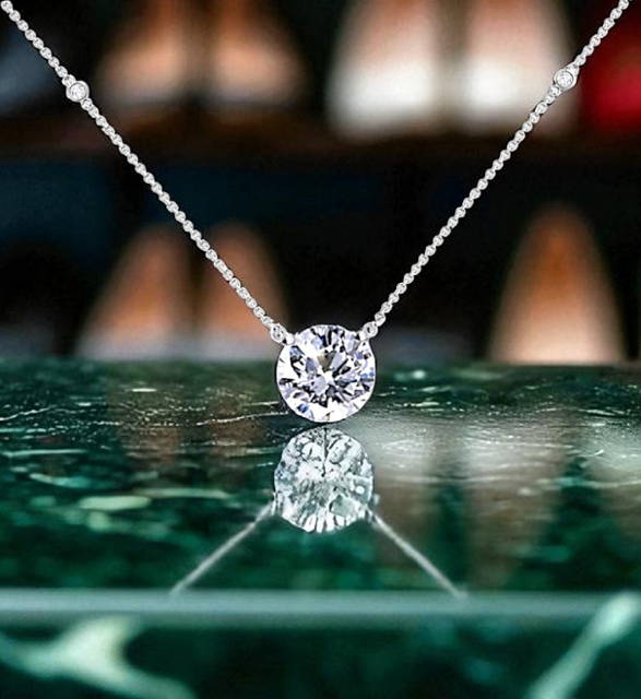 GIA certiffied diamond pendant necklace. Pobjoy Diamonds