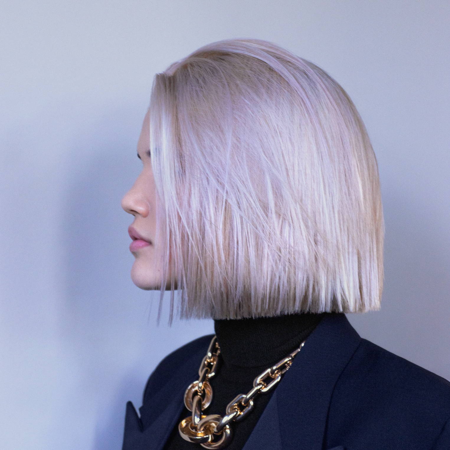 Davines There Must Be An Angel model with short, platinum blonde hair