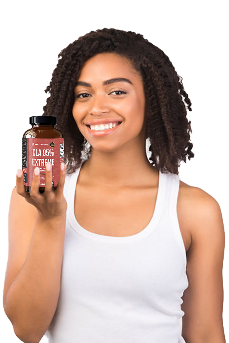 a woman holding a bottle of the best fat burner supplement 