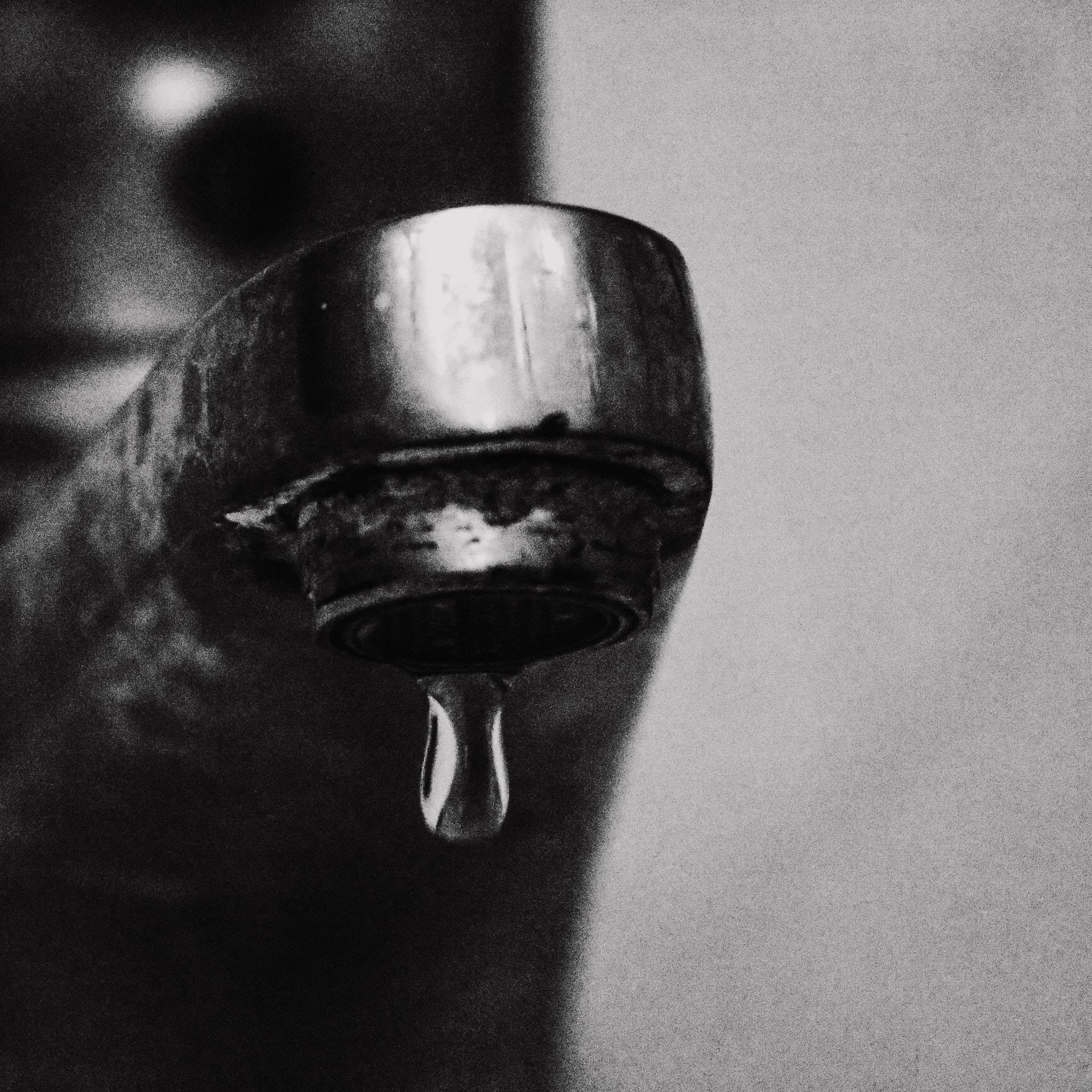 a dripping water faucet