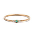 thin yellow gold ring with emerald and diamonds