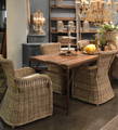 Boho beach woven wicker chairs in a dining room
