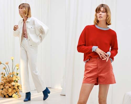 Woman wearing white wed leg denim trousers with blue heeled ankle boots and organic cotton white denim jacket from sustainable womenswear brand Kowtow and woman wearing red knitted jumper with blue collar and cuffs along with high waist high cut coral shorts