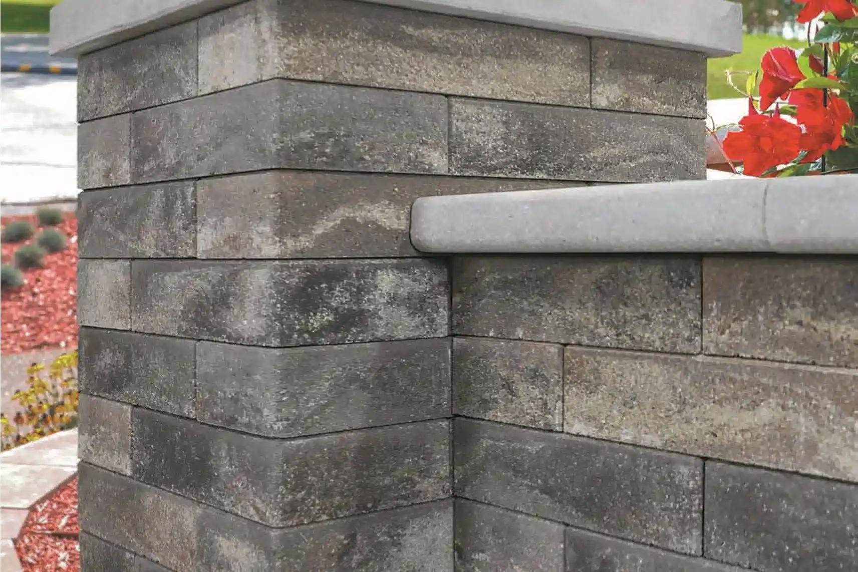 Freestanding stone wall with a pillar both made with Unity Wall Blocks