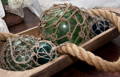 sea glass floats in wood dough bowl