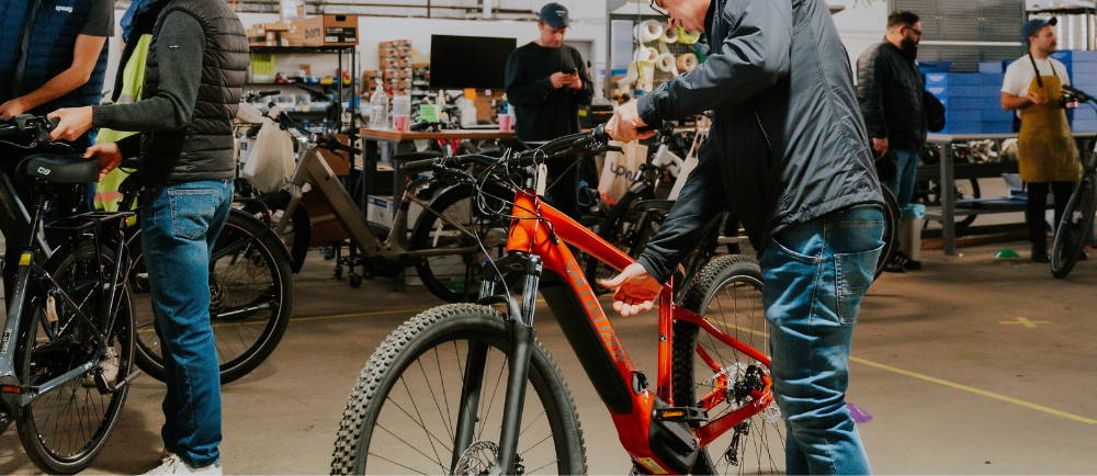 Upway Garage Sale electric bike event with customers