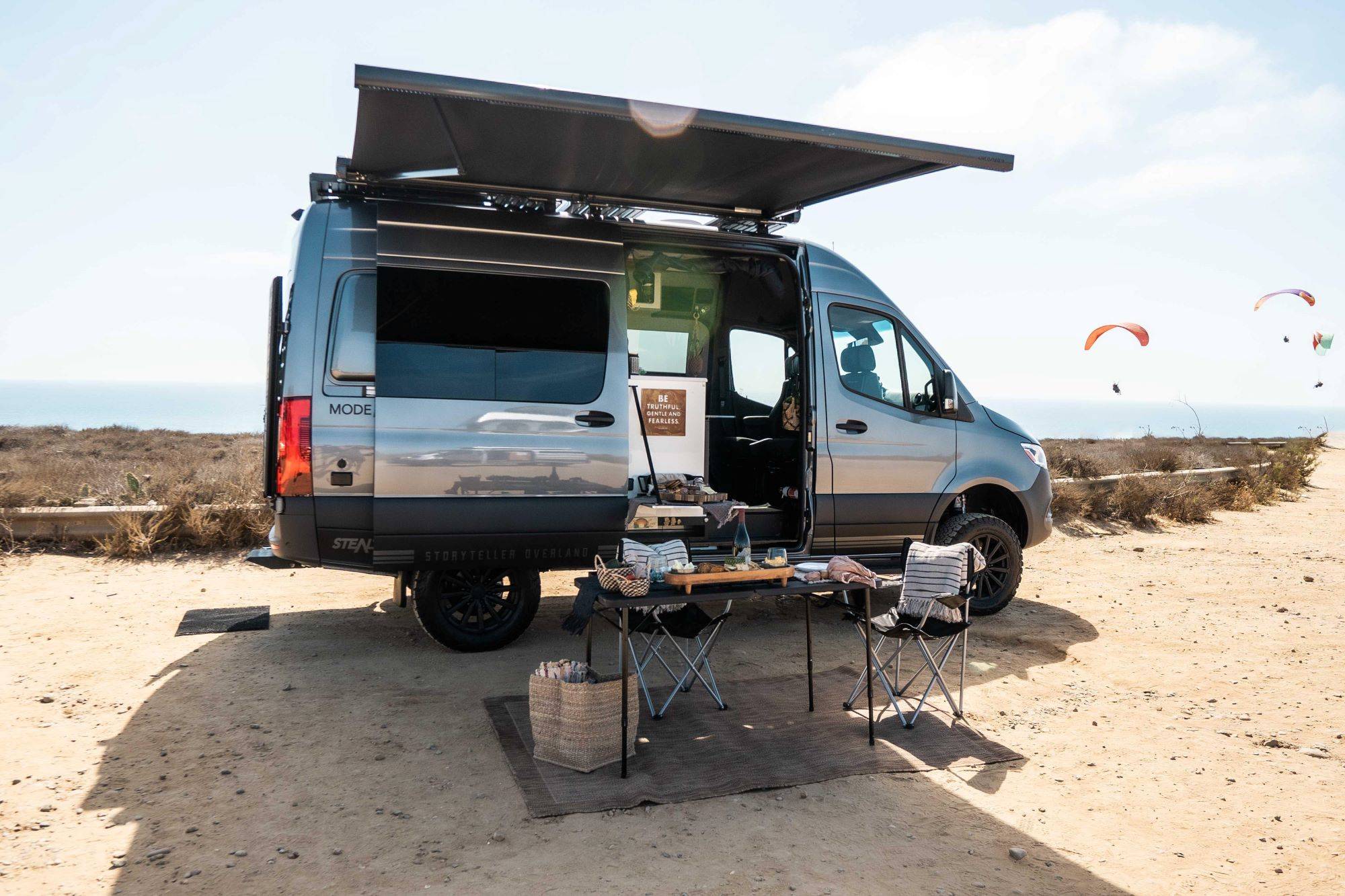 A camper van parked at the beach. Finance your adventure today!