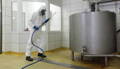 pressure washing facility hazmat suit