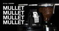 MULLET valtteri bottas 250 gram black coffee bag next to coffee grinder