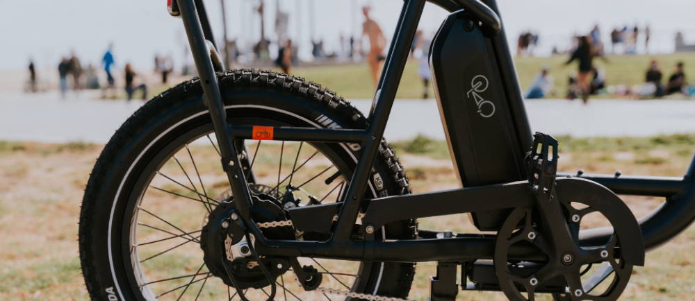a Rad Power Bike at the beach