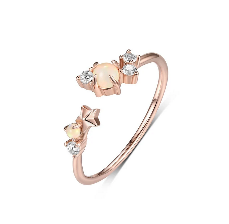 Body jewelry, Jewellery, Art, Metal, Fashion accessory, Ring, Titanium, Font, Illustration, Gemstone