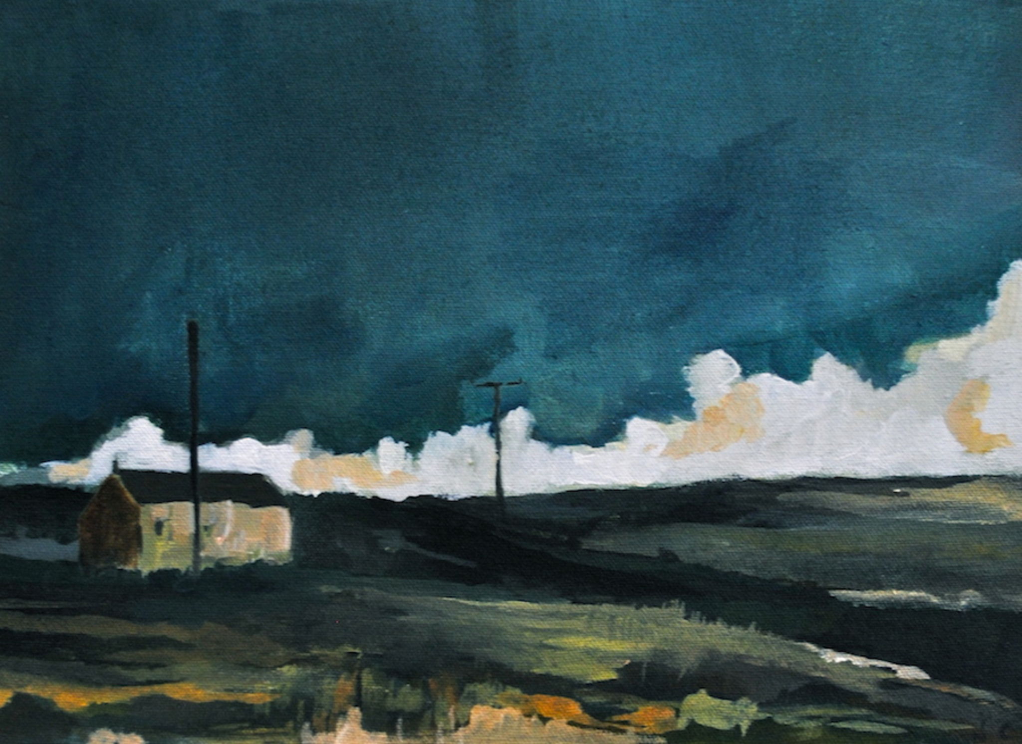 House in the rolling hills and low clouds