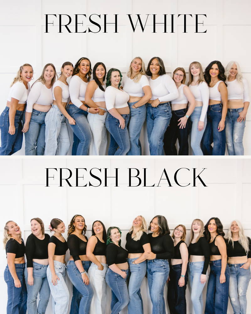 A group of women wearing black and white crop tops with jeans.