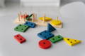 Multicolor Montessori wooden stacking shape blocks.