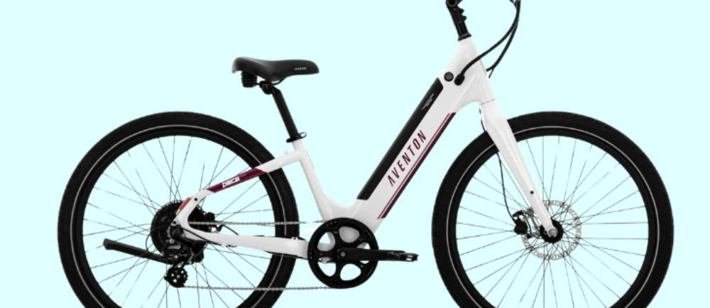 A white Aventon Pace 500.3 electric commuter bike