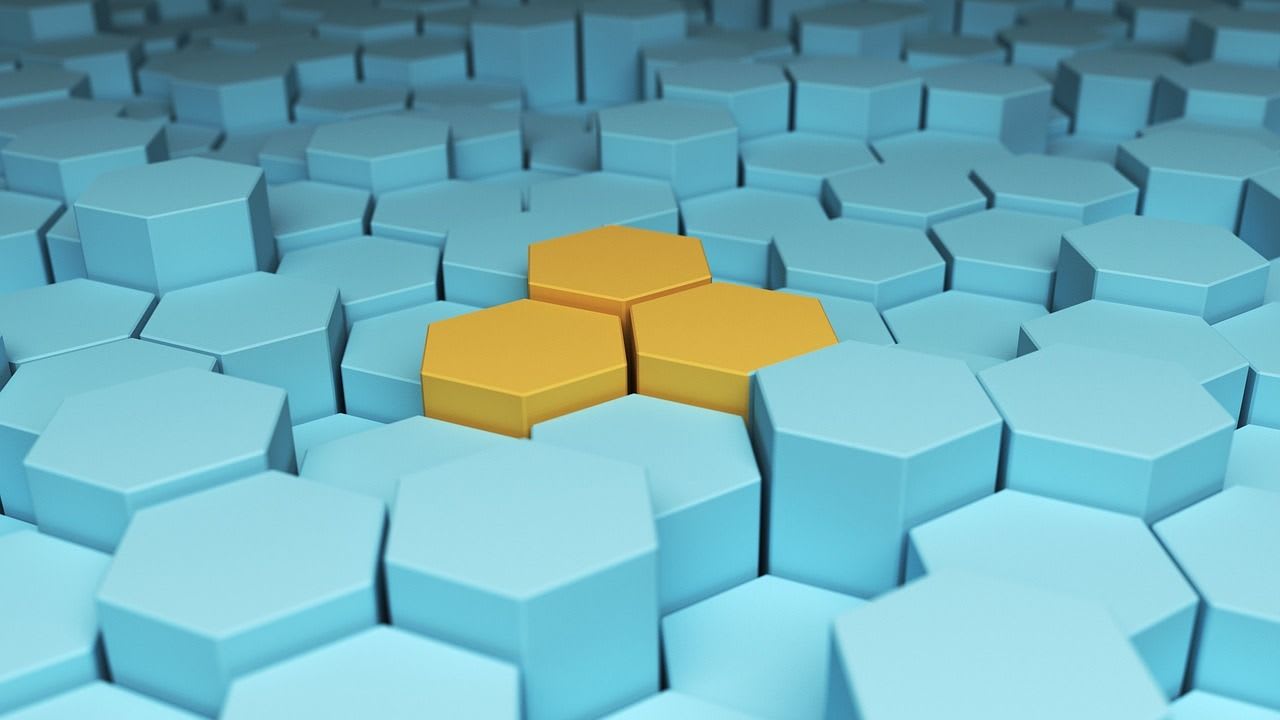 a layer of blue and yellow hexagons