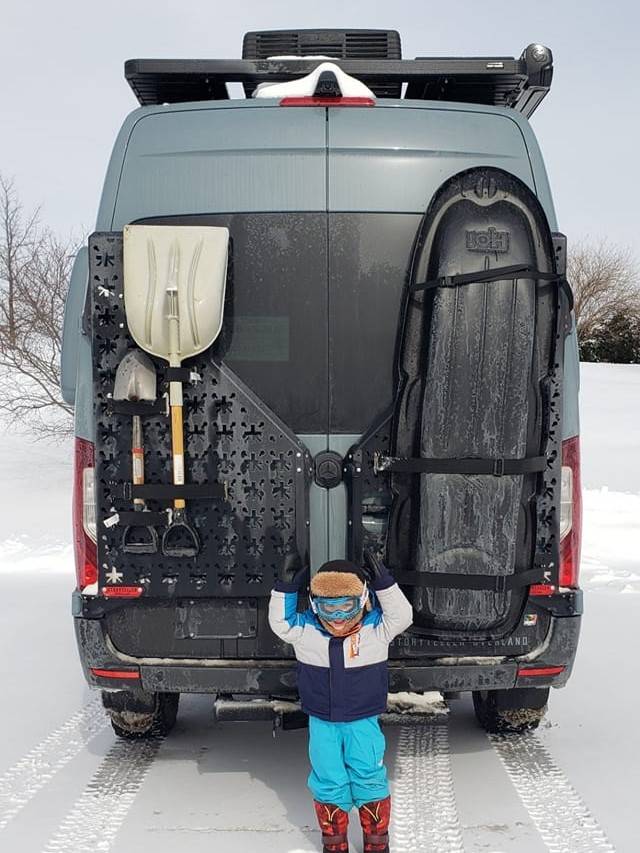 Storyteller Overland NVADER rack being used to carry snow gear.
