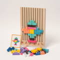 Wooden Montessori Brain Blocks featuring a sliding board, colorful wooden pieces, and play cards.