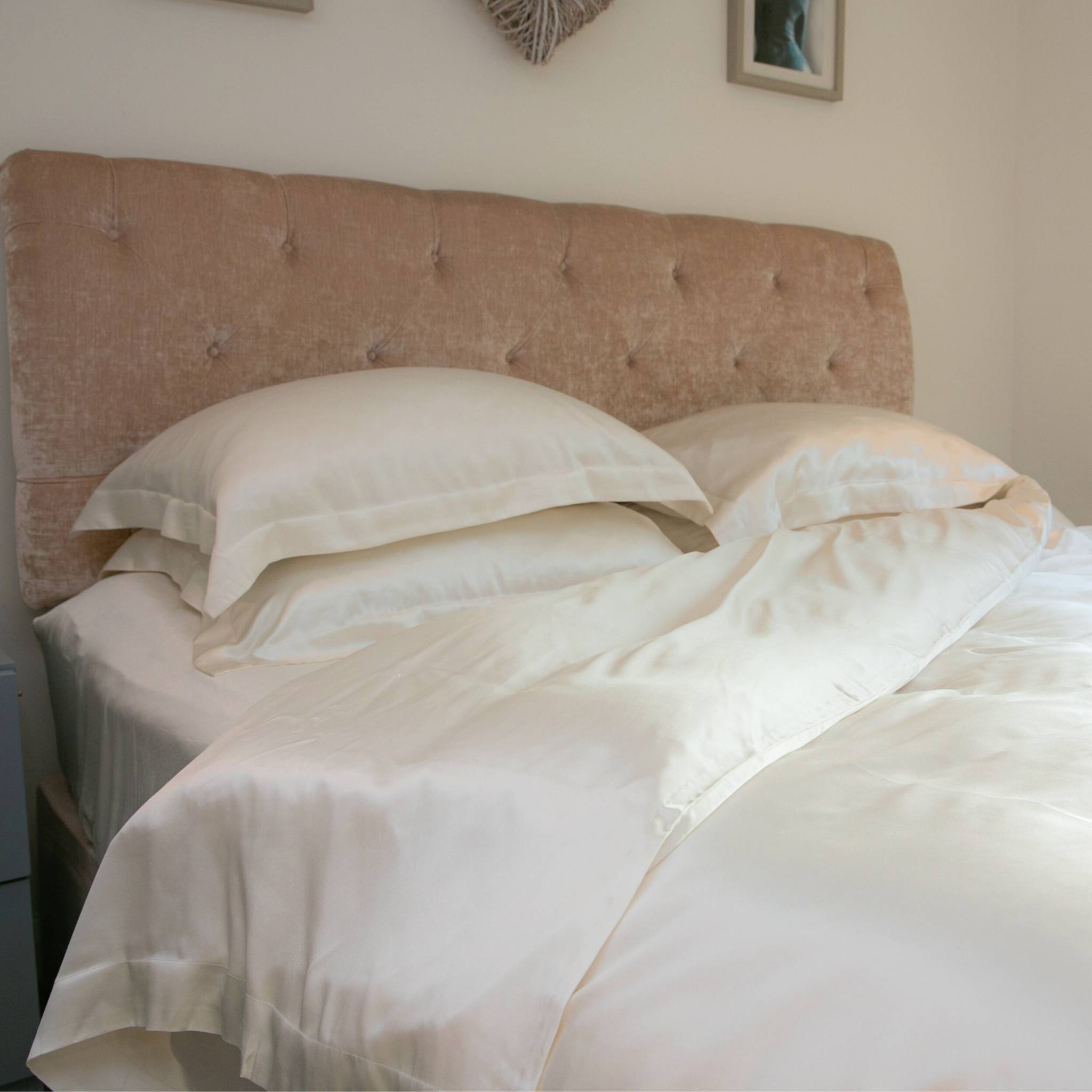 silk bed set with the corner of the duvet cover folded back