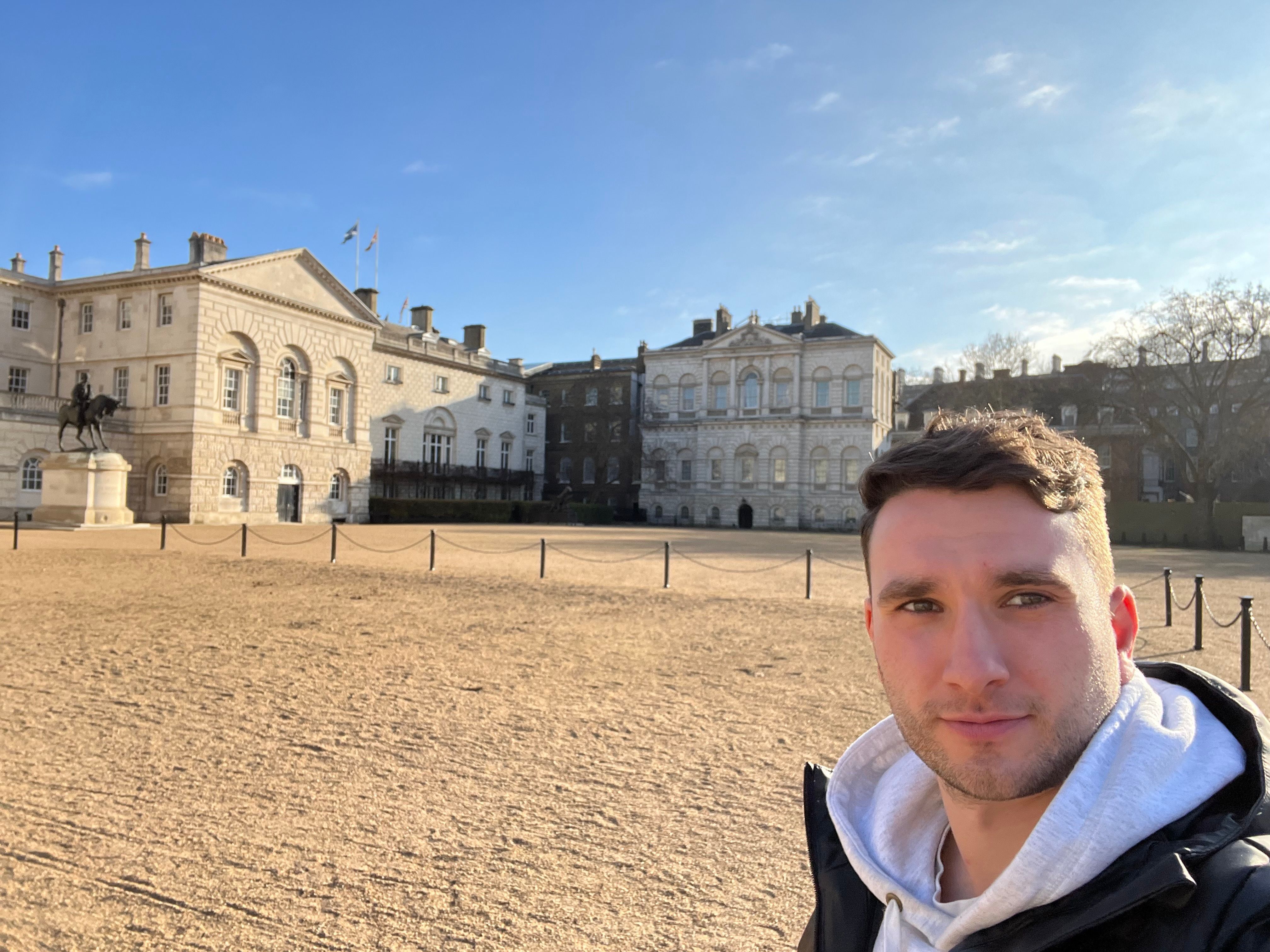 Guy visiting Horse Guards Parade in Central London on a sunny day