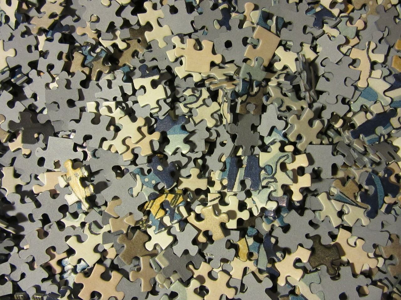 a pile of jigsaw pieces