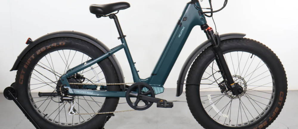 a Velotric Nomad 1 fat tire step through electric bike