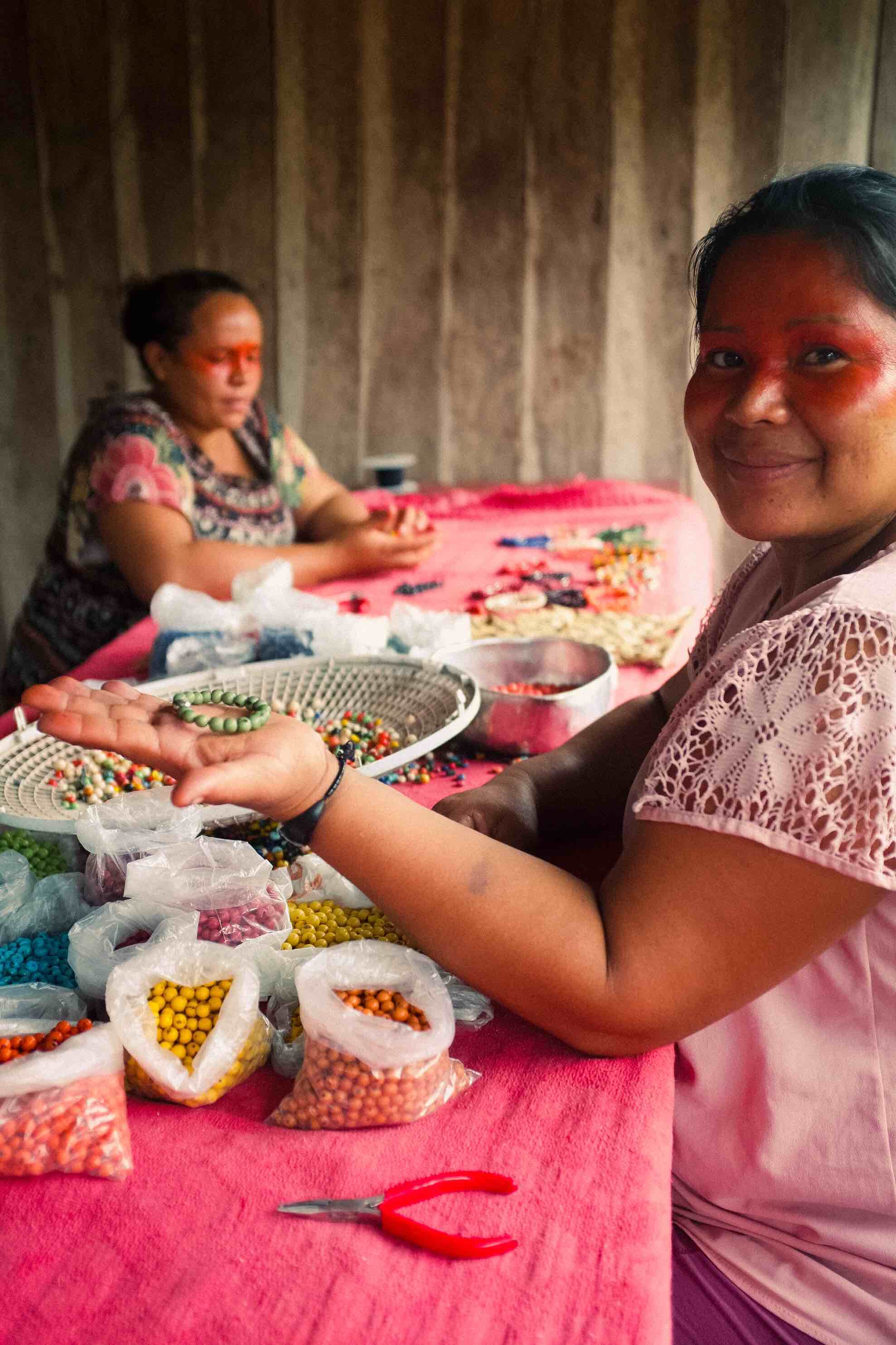 Two Yawanawá community members create our Yawa Bands