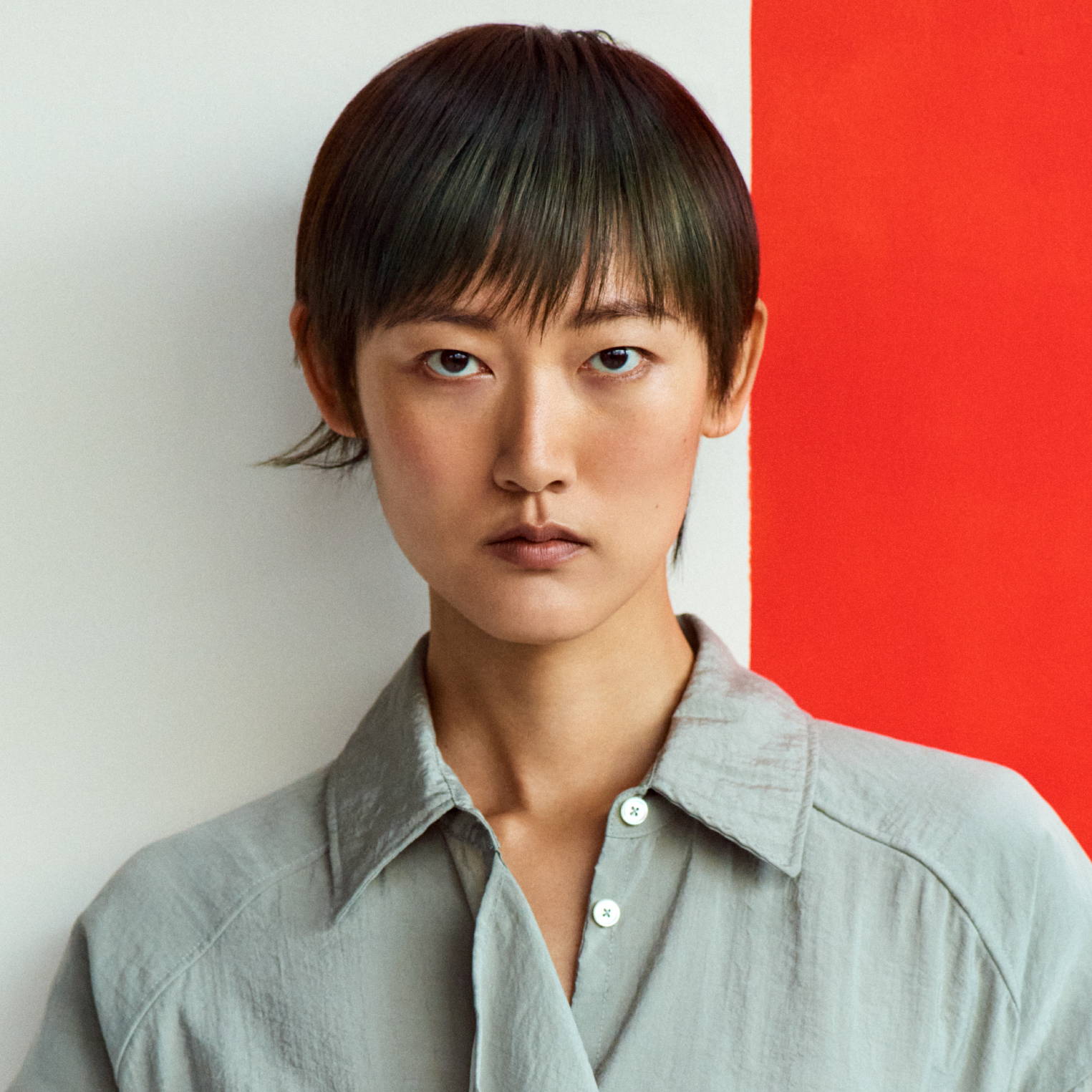 Davines hair model with a sleek pixie cut