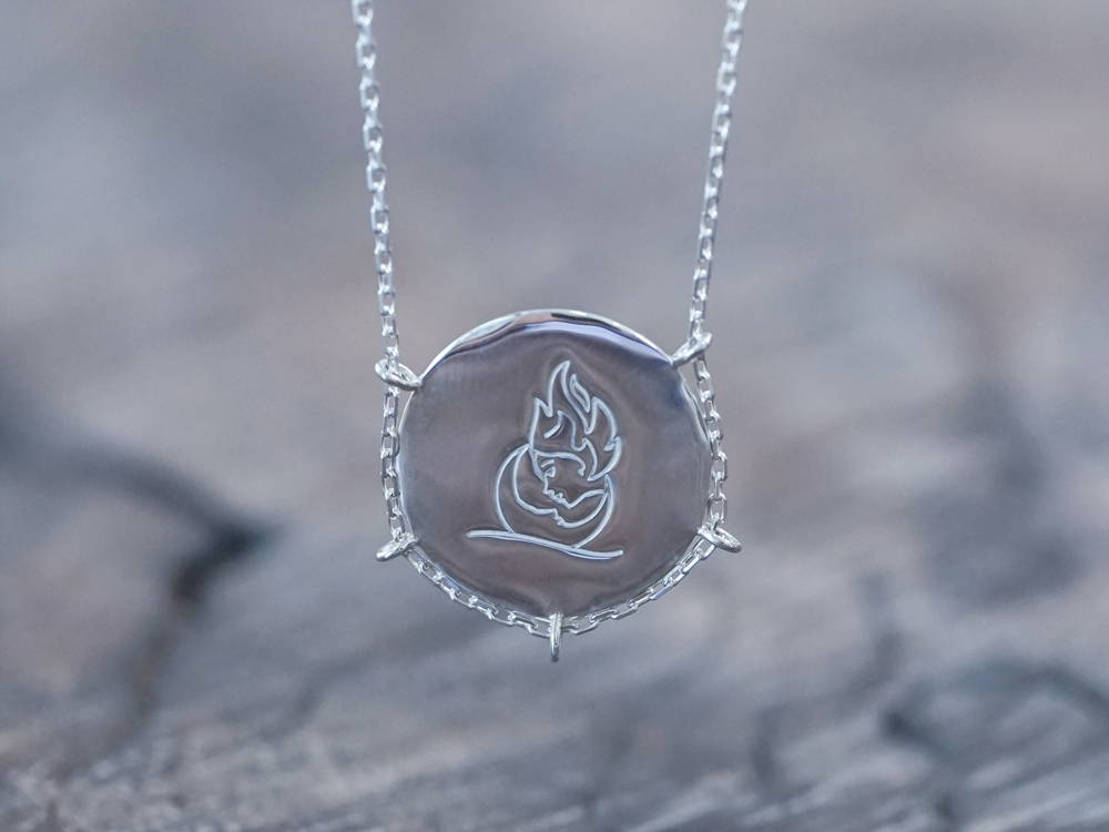 ethical-silver-coin-pendant-necklace-embrace