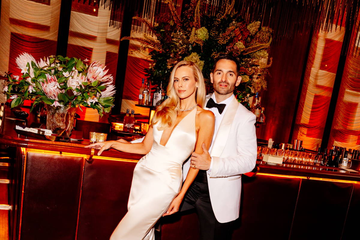 Image may contain: Veronica Blume, Adult, Person, Wedding, Plant, Potted Plant, Clothing, Formal Wear, Suit, Blazer, and Coat