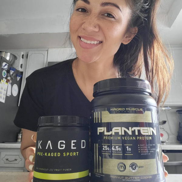 athlete shows her pre workout by kaged pre-kaged sport