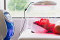 Treatment with the 02DERM LED for radiant, healthy skin.