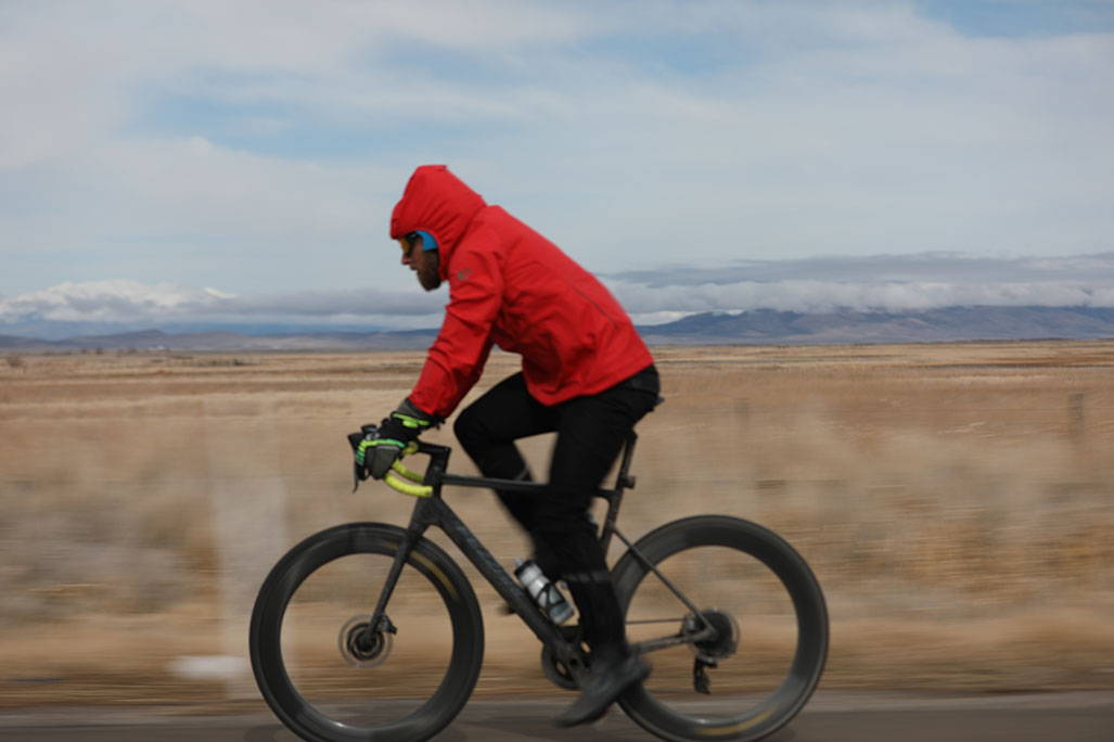 biking in rain jacket profile