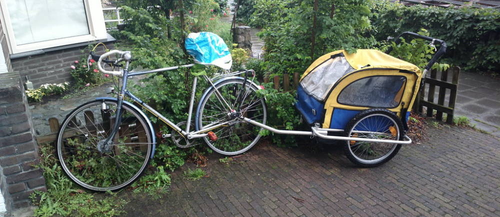 Vintage road bike with stoller bicycle trailer
