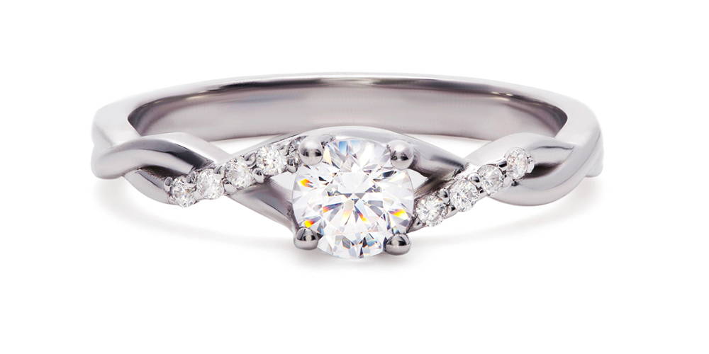 Bague de fiançailles en or blanc au design en signe d'éternité avec un gros diamant