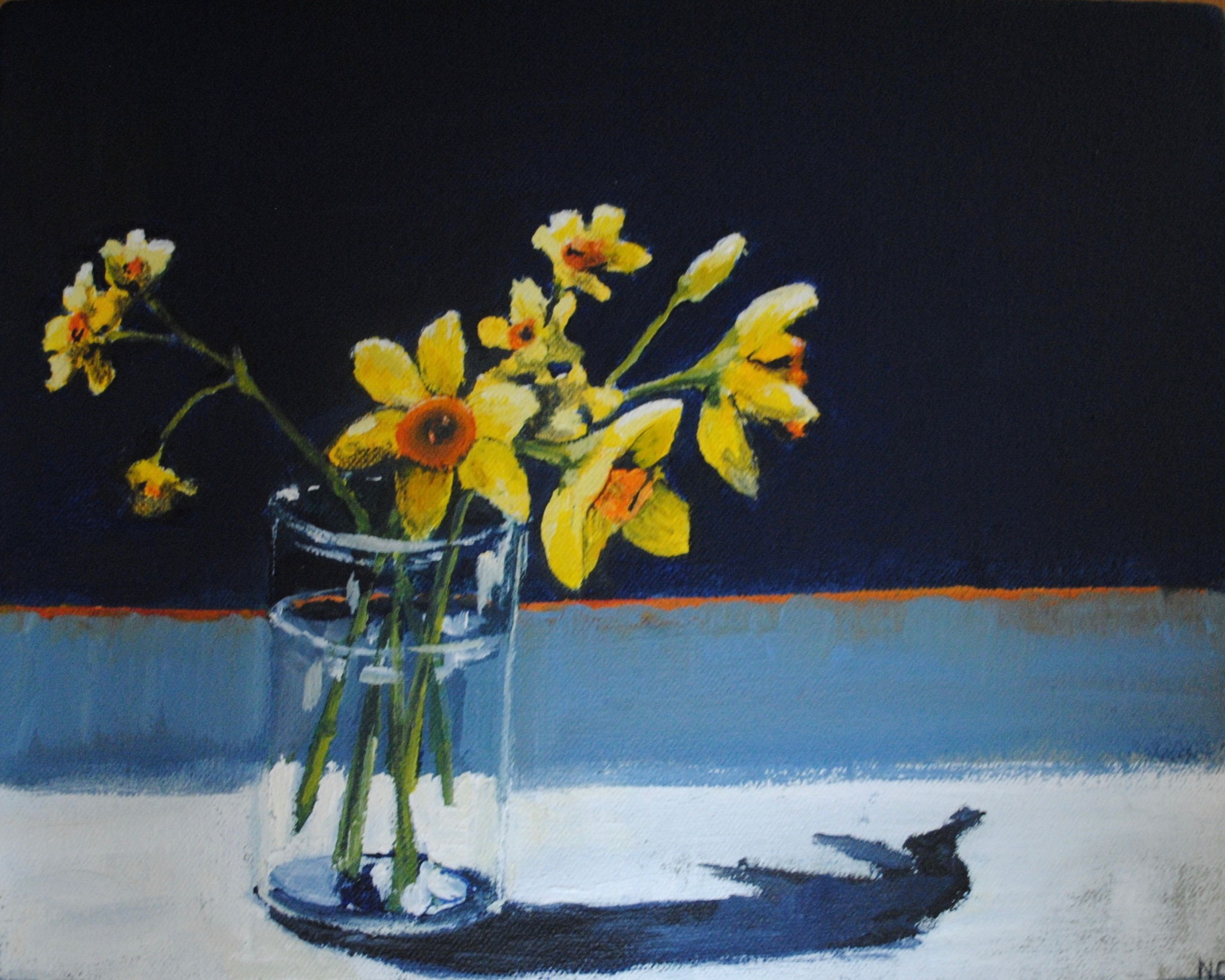 Daffodils in glass with water