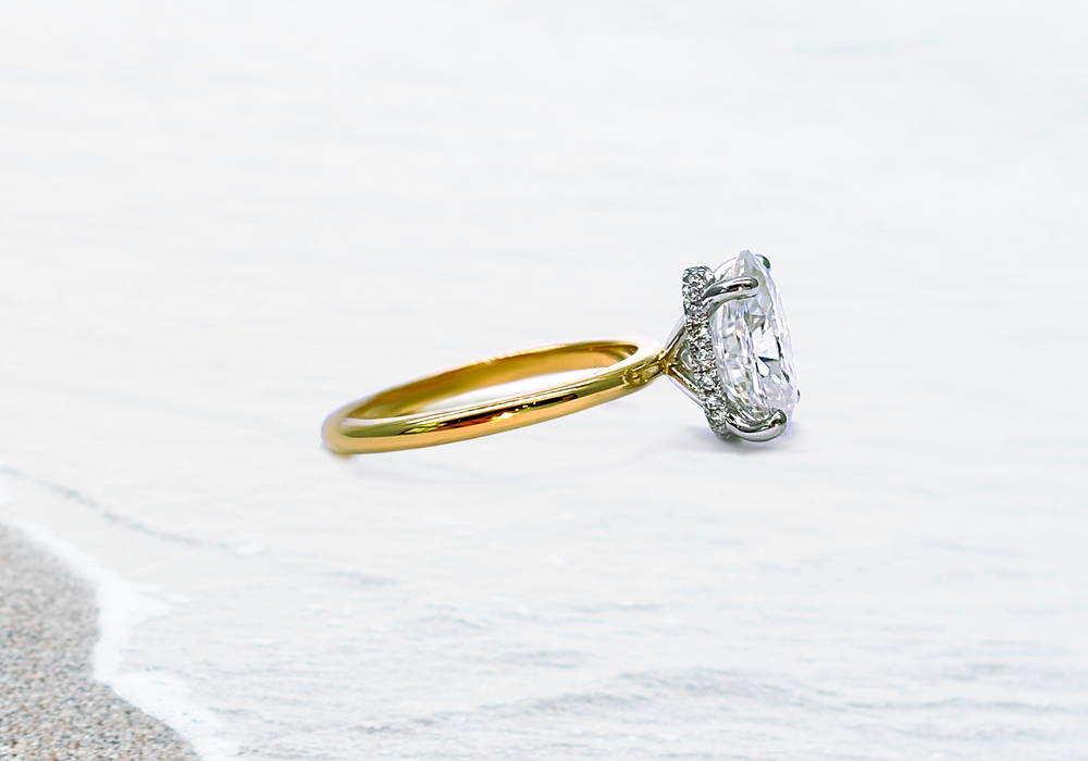 1 carat yellow gold solitaire with hidden halo