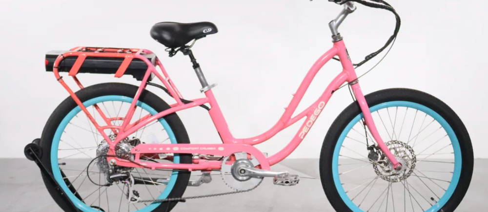 A pink Pedego Comfort Cruiser electric cruiser bike
