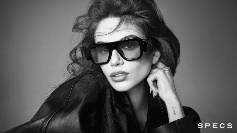 Image may contain: Accessories, Sunglasses, Face, Head, Person, Photography, Portrait, Glasses, Adult, Body Part, and Finger