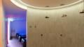 Wellness shower area with curved ceiling LED strip lighting by Havit at DynamiQ Wellness Centre in Canberra ACT.
