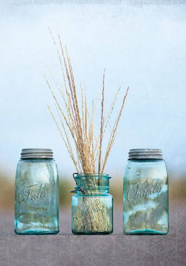 Canning jars labeled faith, hope, and charity.