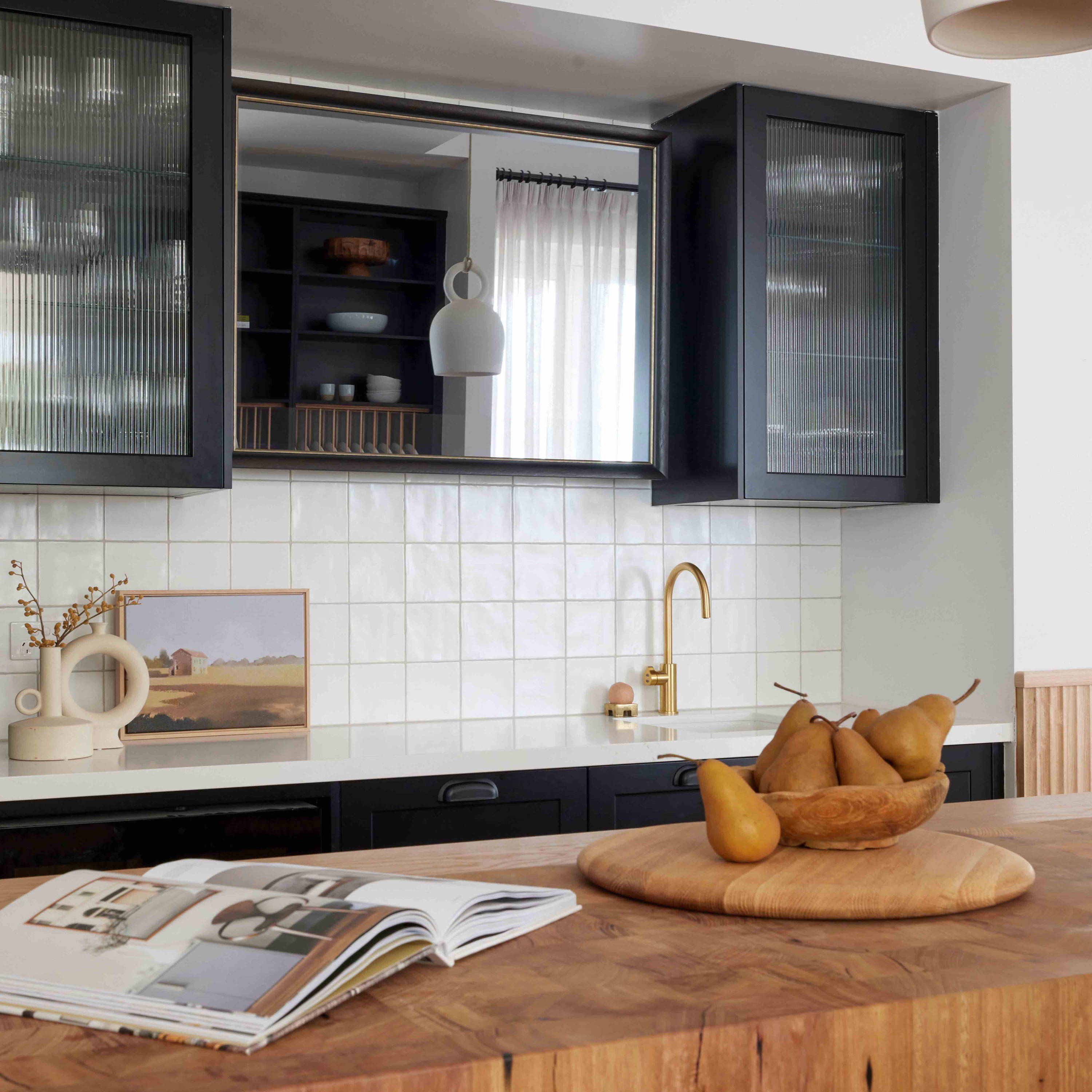 TV-Mirror in Classic Black Frame with Pewter Detail by FRAMING TO A T - A TV-Mirror in the kitchen in a black contemporary frame