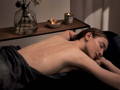 woman having an exfolaiting treatment at the spa