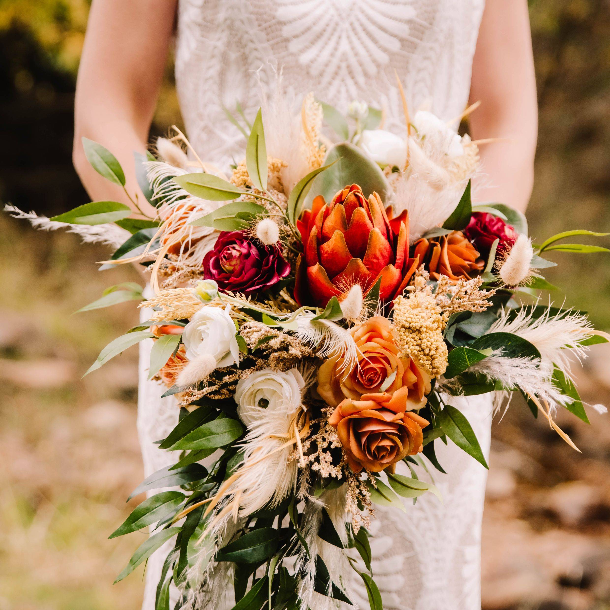 Cascading boho bridal bouquet with fall colors 