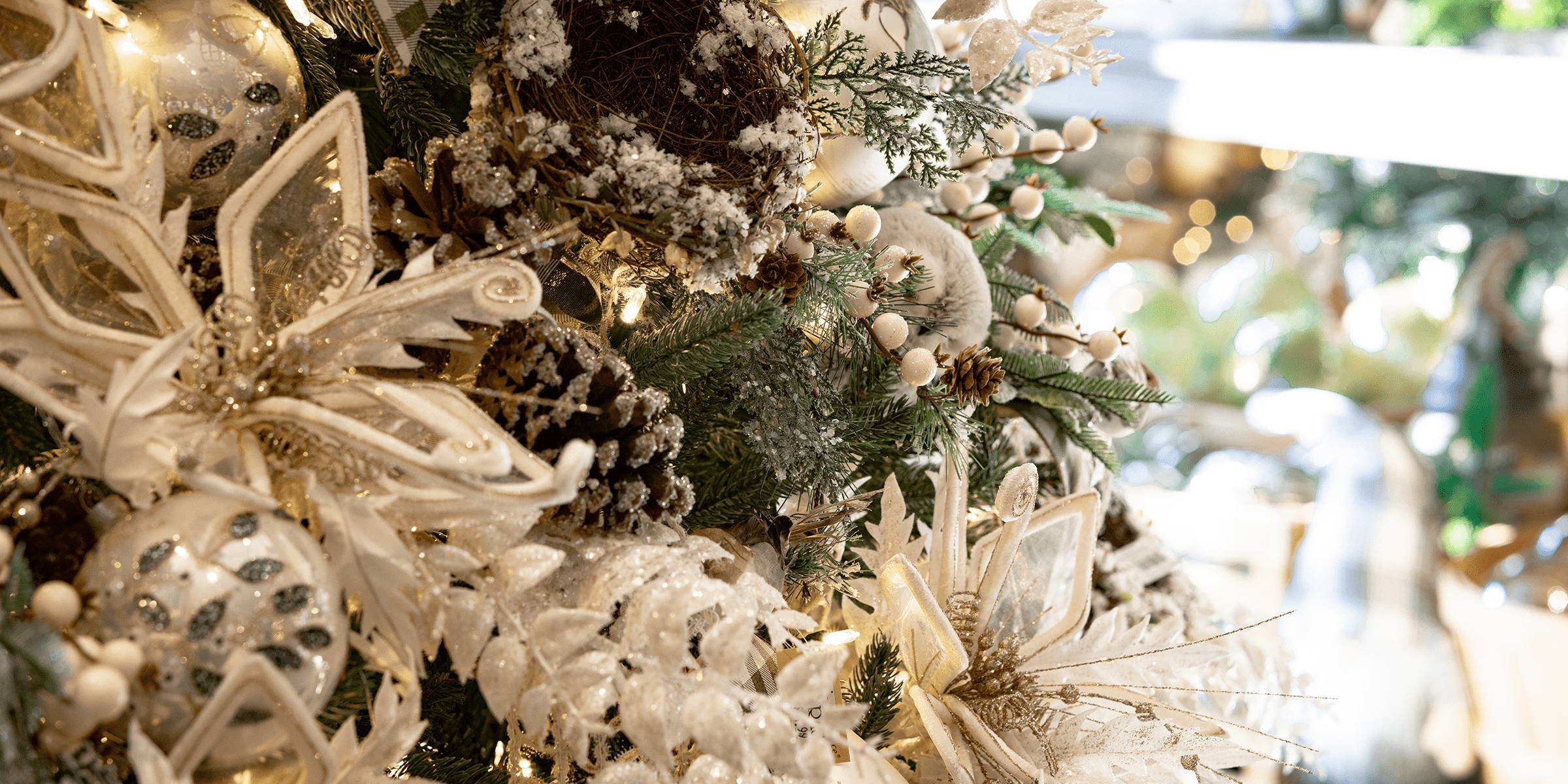 Christmas decor with natural elements including pinecones, berries, and owls