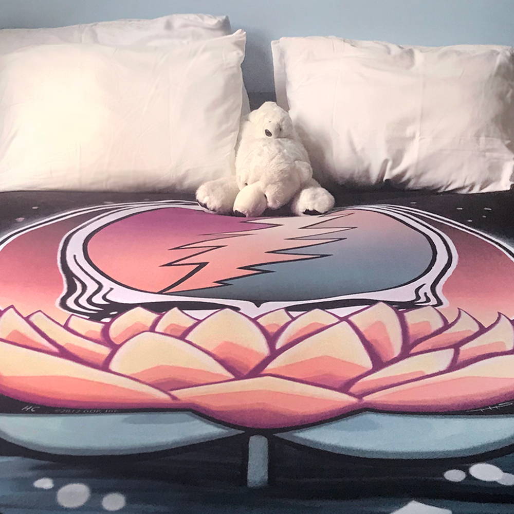 Lotus Sherpa Blanket on bed
