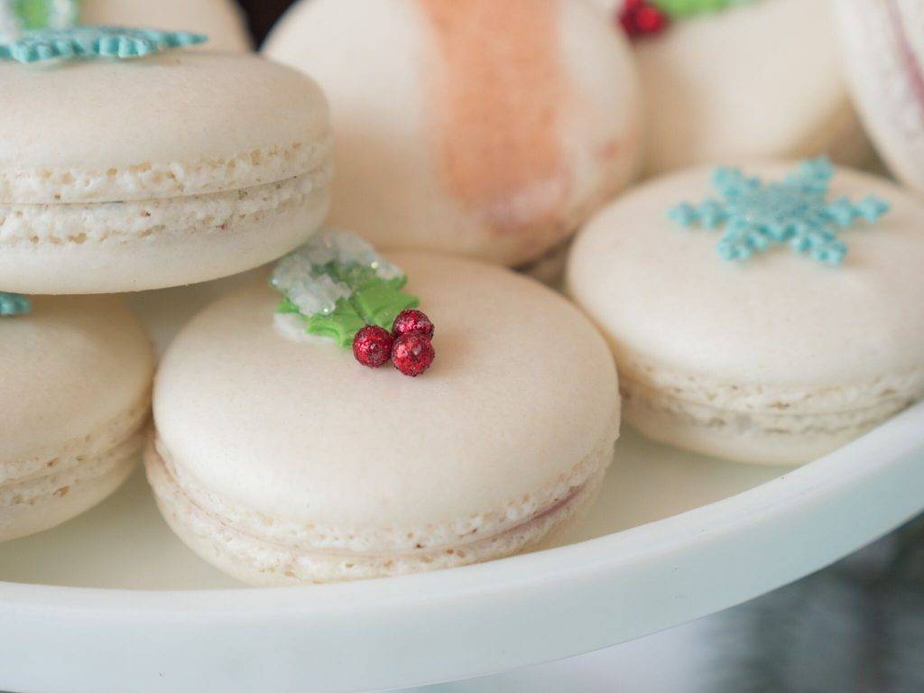 Holiday theme macarons with delicate holiday decorations