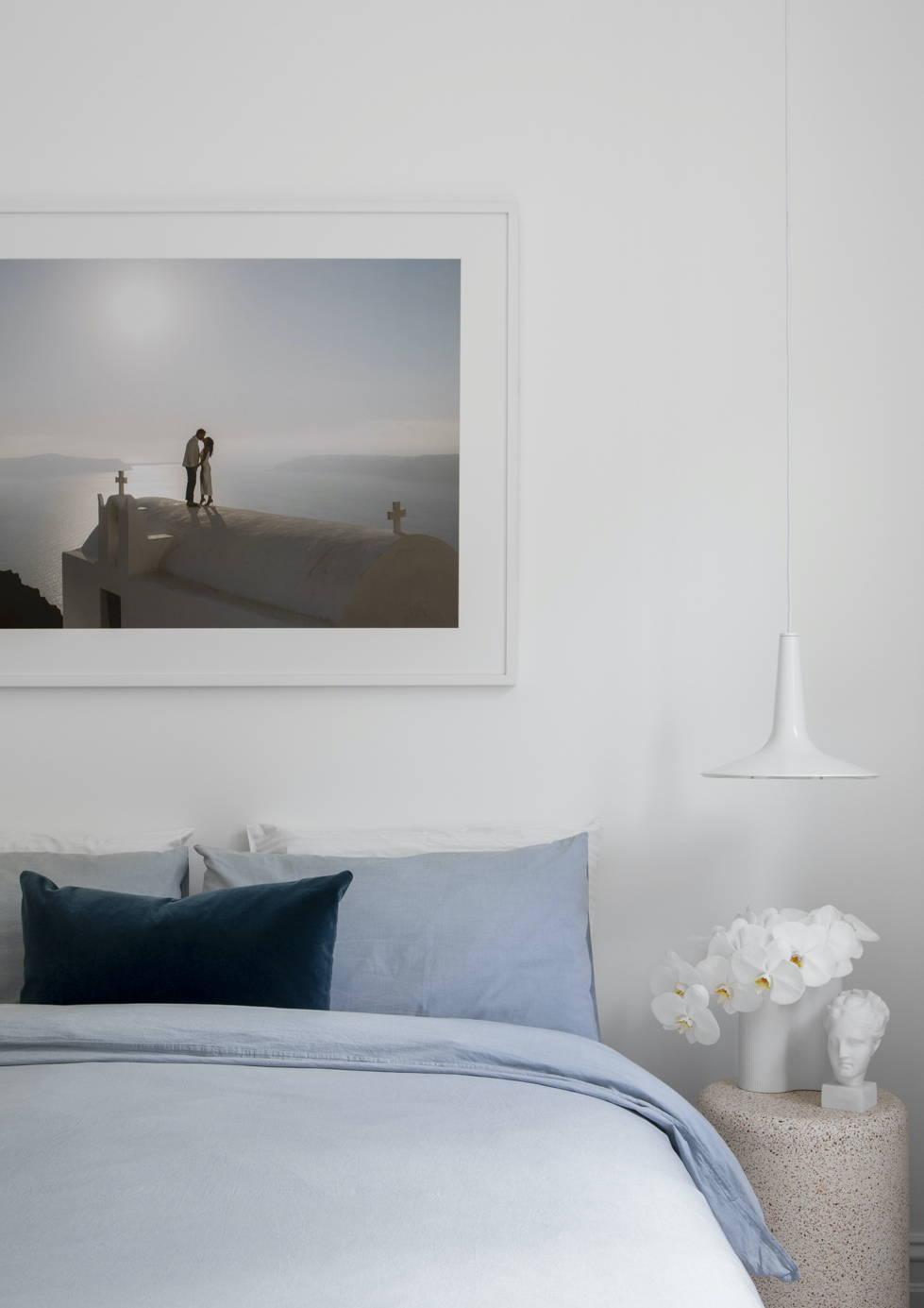 Framed Wedding Photo above the bed 